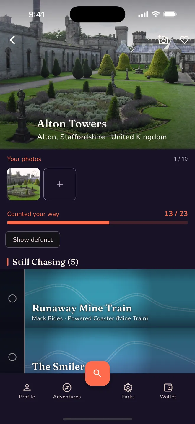 The Alton Towers park page in the app, headed by the rider&rsquo;s own photo of the towers and gardens, showing 13 of 23 coasters counted and a Still Chasing list of the ones they have not ridden.